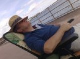 Tom Sayers dozing in a deckchair